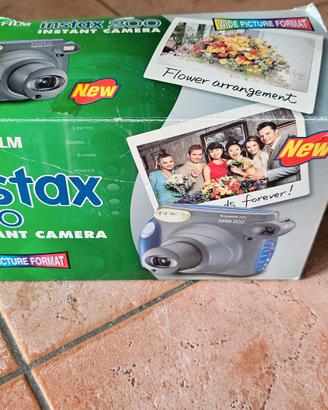 fujifilm instax 200 smontata per pezzi di ricambio