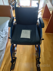 Carrozina per disabili