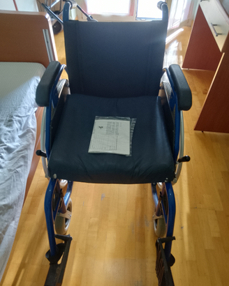 Carrozina per disabili