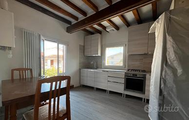 Reggio tre camere due bagni con box auto e balcone