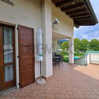 APPARTAMENTO CON TERRAZZA IN RESIDENCE CON PISCINA