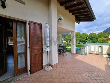 APPARTAMENTO CON TERRAZZA IN RESIDENCE CON PISCINA