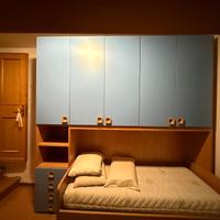 camera a ponte armadio