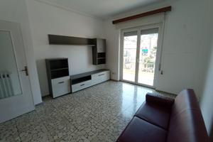 Trilocale con terrazzo,ascensore semiarredato