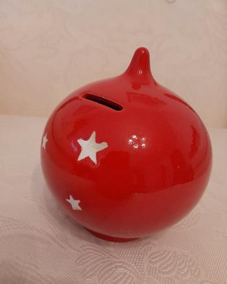 Salvadanaio in ceramica rosso con stelline bianche