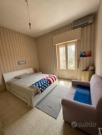 Camera in appartamento condiviso