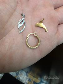 2 ciondoli e 1 orecchino oro 18kt 750
