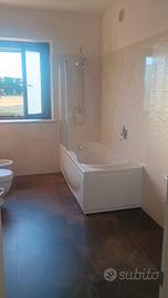 vasca da bagno e box