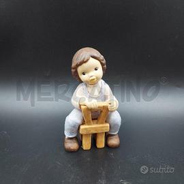 STATUINA MARCO SEDUTO SEDIA