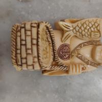 Netsuke antichi bottoni giapponesi.