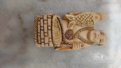 Netsuke antichi bottoni giapponesi.