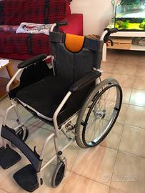 Sedia a rotelle e cuscino antidecubito