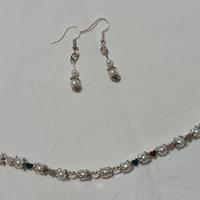 bracciale e orecchini perle bianche