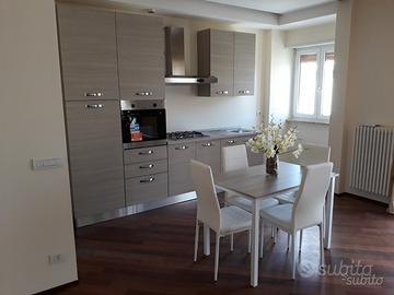 Camere singole in elegante mansarda arredata