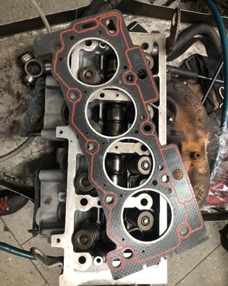 Testata revisionata più guarnizione.