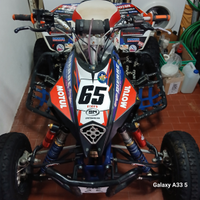 Quad competizione più carrello per il suo trasport