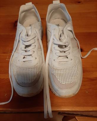 scarpe coveri pelle