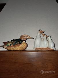 Anatra legno e oche in coccio dipinto 