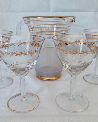 4 calici in cristallo decorati in oro con caraffa