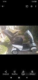 Scooter elettrico carrozzella elettrica anziani