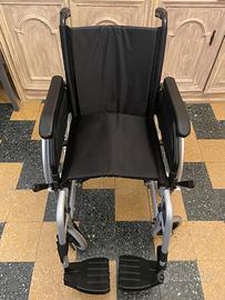 Sedia a rotelle per disabili