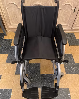 Sedia a rotelle per disabili