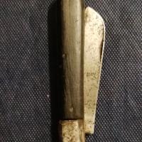 Coltellino con manico in legno nero