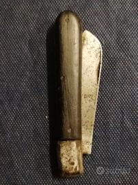 Coltellino con manico in legno nero