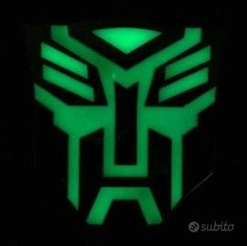 Logo TRANSFORMER Autobot Fluorescent ricarica sole