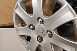 pneumatici invernali e copricerchi Peugeot 