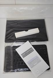 Cover a libro + Tastiera per tablet 