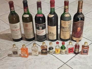 6 bottiglie di vino vecchio  e 10 mignon liquore 