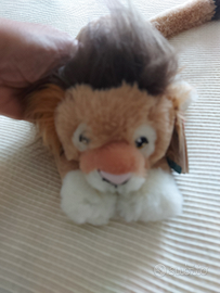 Keeleco leoncino sdraiato peluche