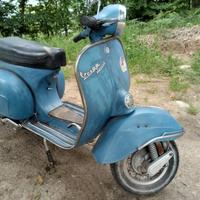 Vespa e motoslitta