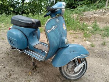 Vespa e motoslitta