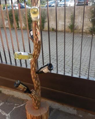 Tronco in legno porta bottiglie di Vino
