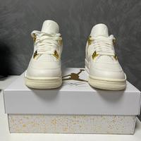 Jordan 4 metallic gold