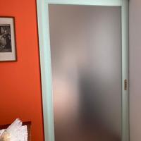 Porta scorrevole con scrigno