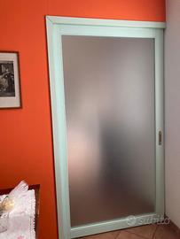 Porta scorrevole con scrigno