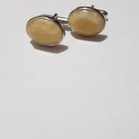 gemelli in argento Prada