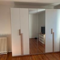 Camera completa con specchio ancora imballato