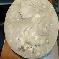 scultura volto di donna in pietra,reperto storico