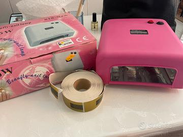 Lampada unghie, cartine. Unghie e glitter