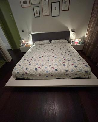 Letto matrimoniale e comodini