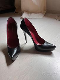 Scarpe nere in nappa, tacco esagerato