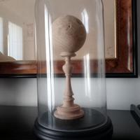 Ampolla di vetro con sfera legno