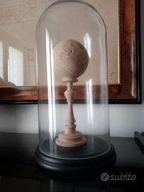 Ampolla di vetro con sfera legno