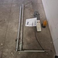 Motorizzazione porta basculante