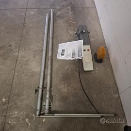 Motorizzazione porta basculante