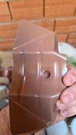 Fermaneve a farfalla per tetto